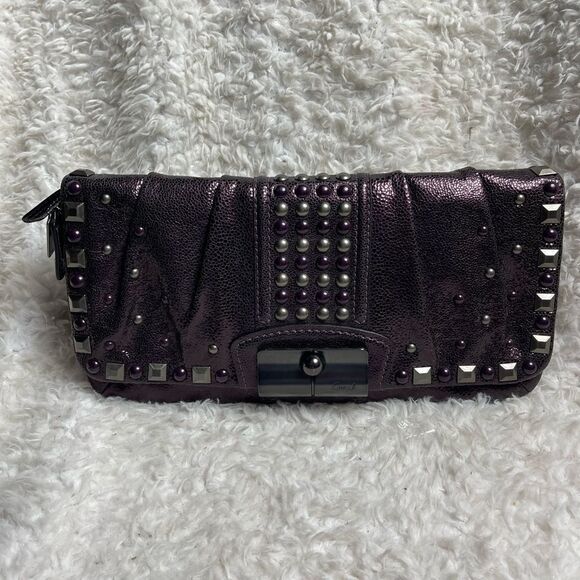 Coach Handbags - Coach Kristin Studded Clutch crackled
Metallic Aubergine leather.